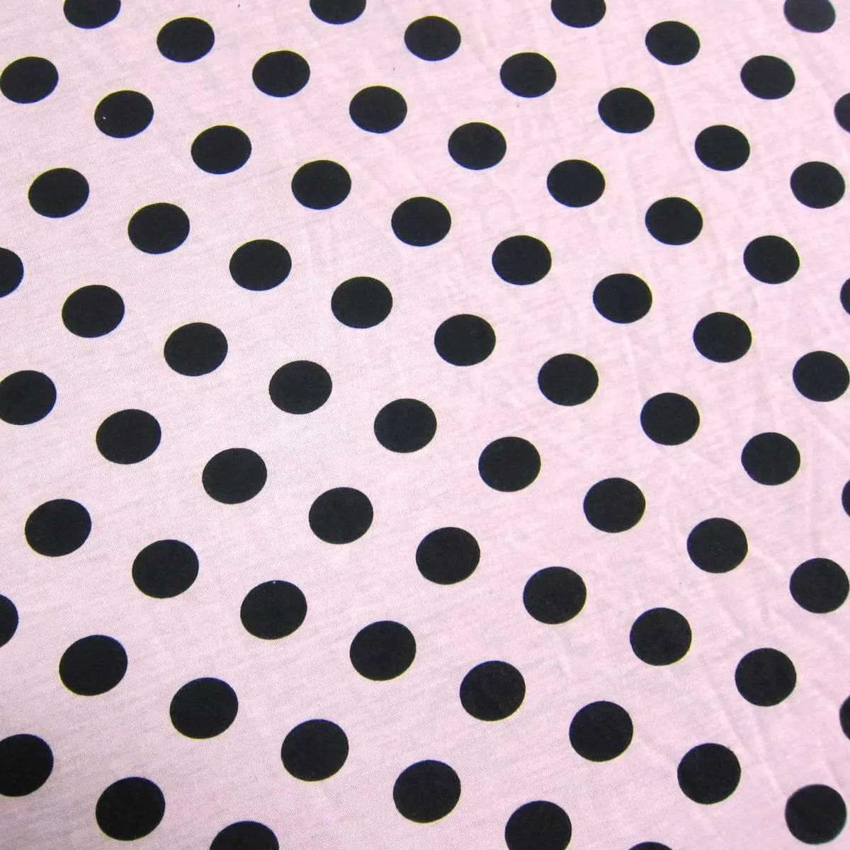 Black Dots On Salmon Cotton/Poly Jersey Fabric