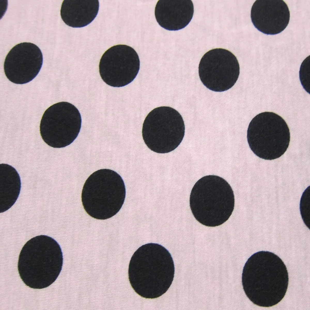 Black Dots On Salmon Cotton/Poly Jersey Fabric