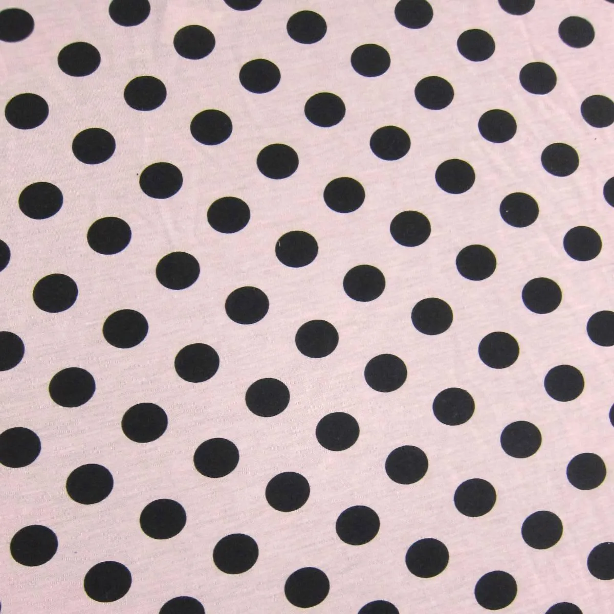 Black Dots On Salmon Cotton/Poly Jersey Fabric